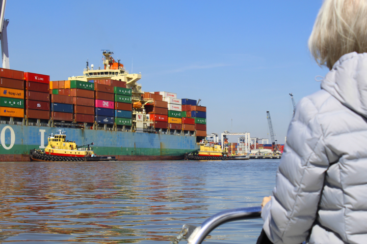 a person sitting on a boat in the water